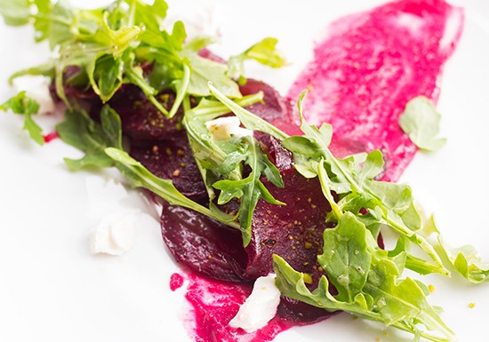 Roasted heirloom beet salad with goat cheese, beet meringue, toasted pisachio and honey-thyme vinaigrette.