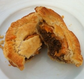 Guess Where I'm Eating this Australian Meat Pie and Win a $25 Gift Card to Tee's Golf Grill!