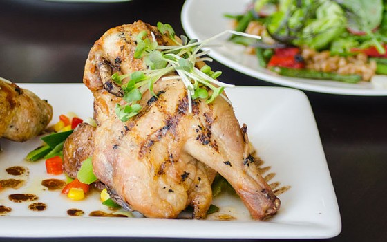 Grilled Cornish hen with oven-roasted potatoes and leeks with black bean succotash. | Bixby's