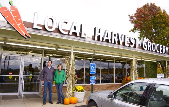 Local Harvest Grocery co-owners Patrick Horine and Maddie Earnest in front of their new location in Kirkwood. - Liz Miller