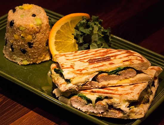 "Bombay Panini" with grilled chicken, cilantro, pepper-jack cheese, baby spinach and spicy curry sauce on naan, with a side of quinoa. - Photos by Mabel Suen