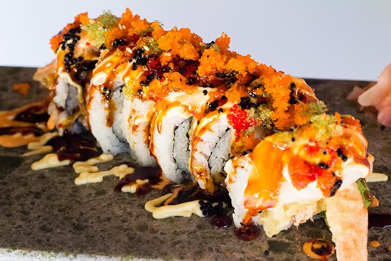 Sushi House's "White Tiger" roll with deep-fried shrimp, crab, asparagus, avocado and white tuna. | Photos by Mabel Suen