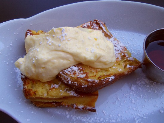 The brioche French toast with lemon curd at Brasserie by Niche. - Emily Wasserman