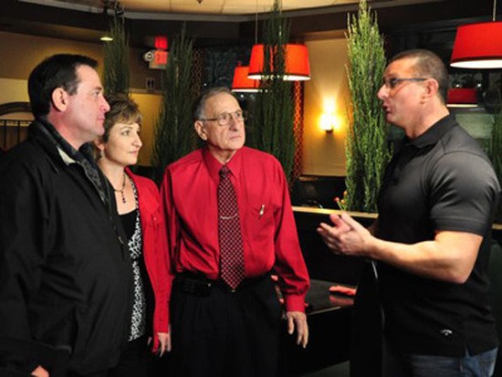 Robert Irvine pumps up John Meglio (left) on Restaurant: Impossible - Food Network
