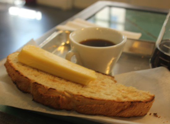 Toasted French peasant bread with Havarti cheese and Cesmach coffee. - Nancy Stiles