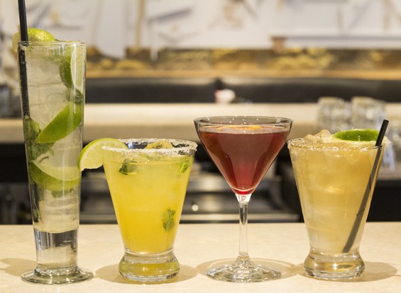 Cantina Laredo's drinks are stiff: the Mojito, "Ginger Mint Mango Rita,"  "Aphrodite Rita" and "Cabo Flip." | Mabel Suen