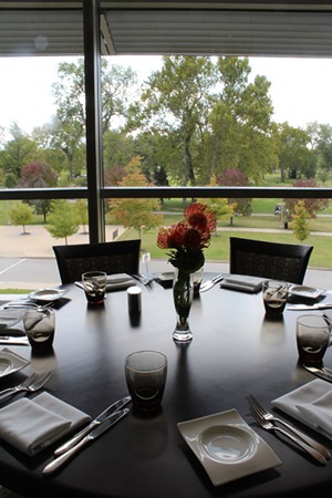 A view of Forest Park from a dining table at Bixby's. - Mabel Suen