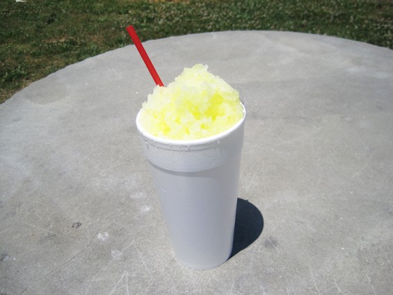 A pineapple snow cone. Please notice the utensil. - Dr. Freeze