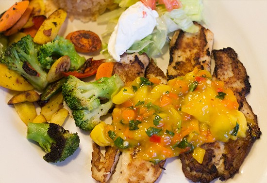 Grilled tilapia topped with mango salsa -- one of the many seafood specials available for Lent.