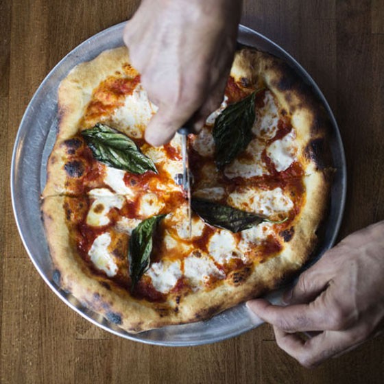 A simple, delicious, margherita pizza, with tomato sauce, mozzarella, basil. | A Pizza Story