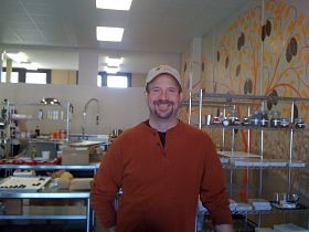 Brian Pelletier behind the counter of Kakao Chocolate's new location on Manchester Avenue in Maplewood. - Aimee Levitt