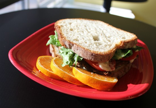 A build-your-own sandwich from Frida's Deli piled high with housemade smoked bacon made with local tempeh, lettuce, tomato and mayo served on gluten-free bread. - Liz Miller