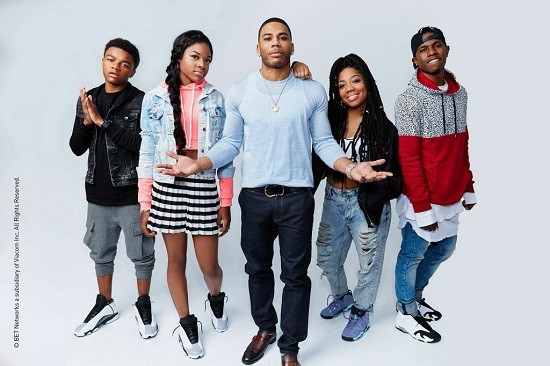The Saintliest of Lunatics, Nelly, with his family. - via BET