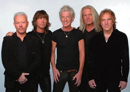 Kevin Cronin of REO Speedwagon: "My 'do was more of a 'mull-fro'...equal parts mullet and Afro"