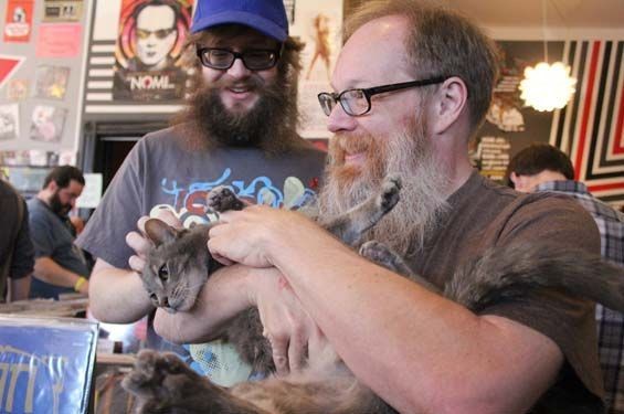 Graham Matthews and Stephen Houldsworth and everyone's favorite record store cat. - Mabel Suen