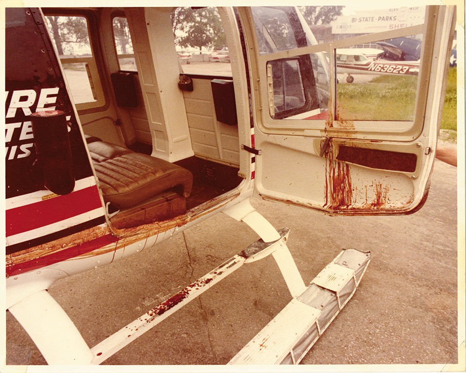 Barklage kept several photos in his scrapbook showing his helicopter covered in Oswald's blood. - ALLEN BARKLAGE PERSONAL EFFECTS