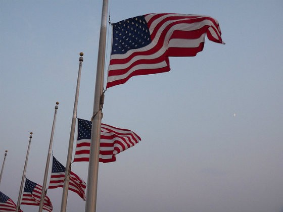 Half-mast flags are a common sign of mourning. But have they ever mourned something a Supreme Court decision? - Photo Courtesy of Flickr/Susan Ujka's Collection