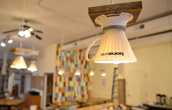 Old coffee brewers that eventually broke over time are now light fixtures in Kitchen House. The coffee shop reused and repurposed many of their decorations and furniture. - TOM HELLAUER