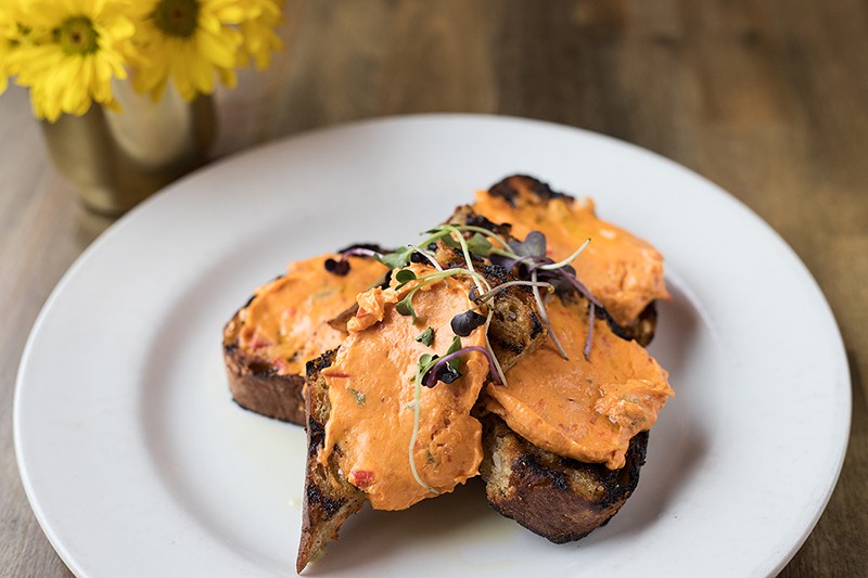 “Nashville's Pimento Cheese Toast” is topped with microgreens. - MABEL SUEN