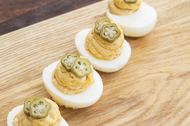 Deviled eggs with pimento cheese and pickled okra. - Mabel Suen