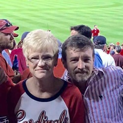 Chris Sanna was shot in the back on Friday after celebrating the birthday of his mom, Candis Sanna, left, at a St. Louis Cardinals game. - Image via Facebook