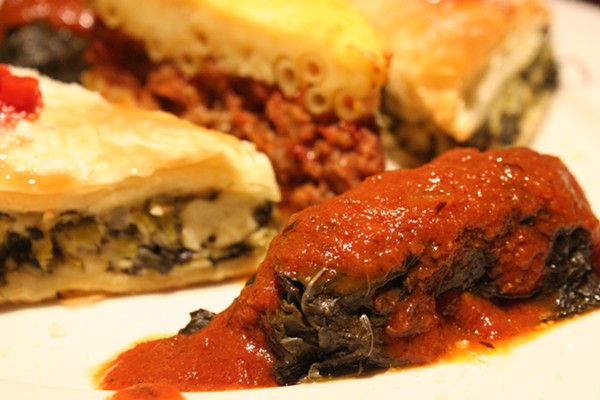 A combination platter with pastitio, dolmades and spinach pie. - Johnny Fugitt
