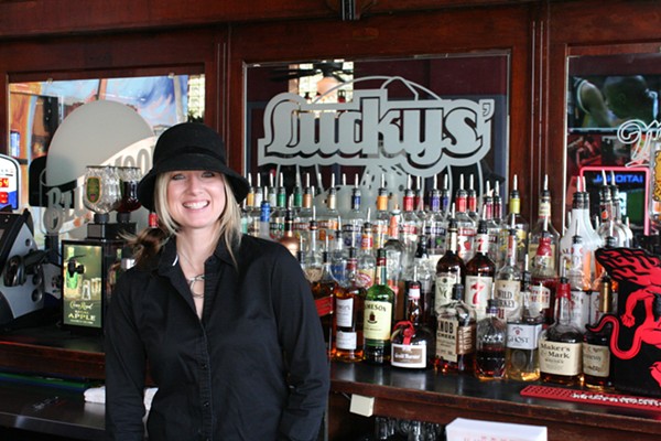 Bartender Faith is one of the friendly people pouring drinks at Luckys'. - JOHNNY FUGITT