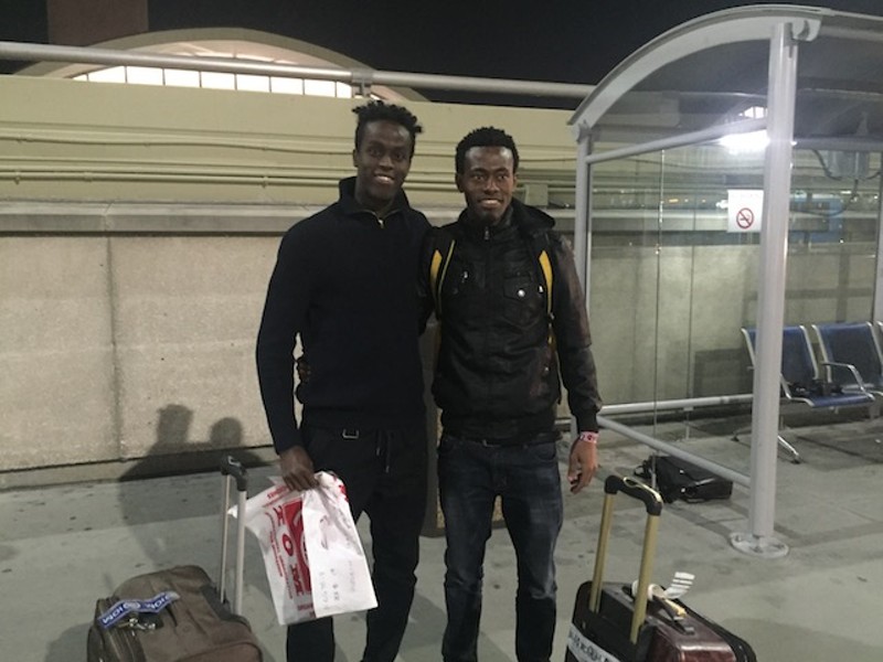 Sa'ad Hussein and Saadiq Muhammad reunited last week at Lambert airport. - COURTESY OF J.R. BIERSMITH