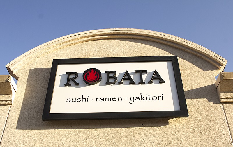 Robata is packed, but the servers keep things moving. - PHOTO BY MABEL SUEN