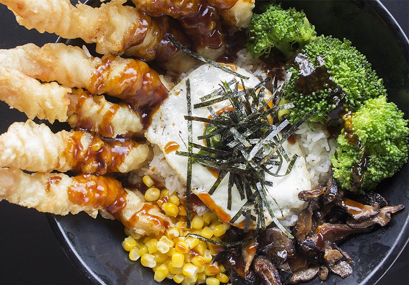 The tempura rice bowl features poached eggs, sliced nori, butter corn, shiitake mushrooms and tempura sauce. - PHOTO BY MABEL SUEN