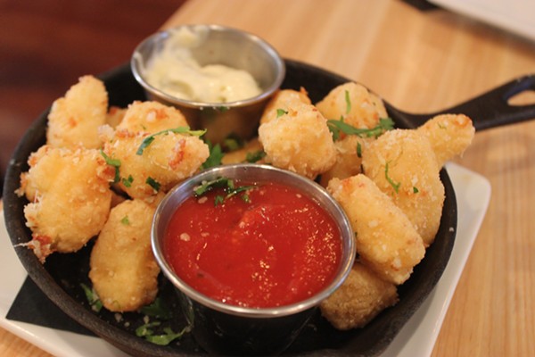Cheese curds are fried and offered with two sauces for dipping. - PHOTO BY SARAH FENSKE