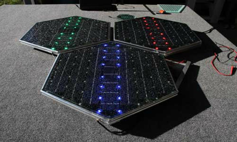 These hexagon plates will be install on a section of Route 66 in Conway, Mo. - SOLAR ROADWAYS