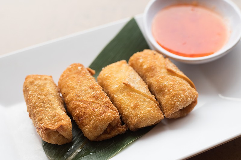 Blue crab Rangoon is made with real crab meat and served with sweet chile sauce. - MABEL SUEN