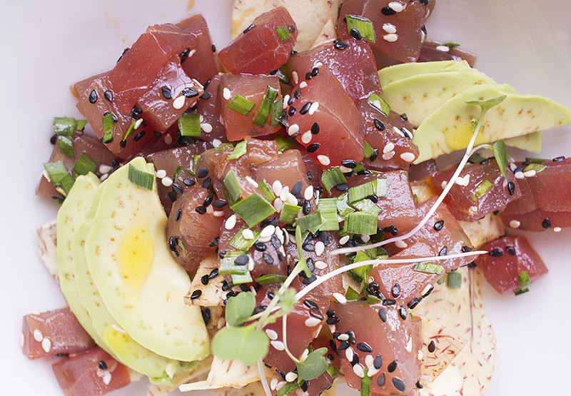 Tuna poke with yellow-fin tuna, soy, ginger, sesame and cassava. - PHOTO BY MABEL SUEN