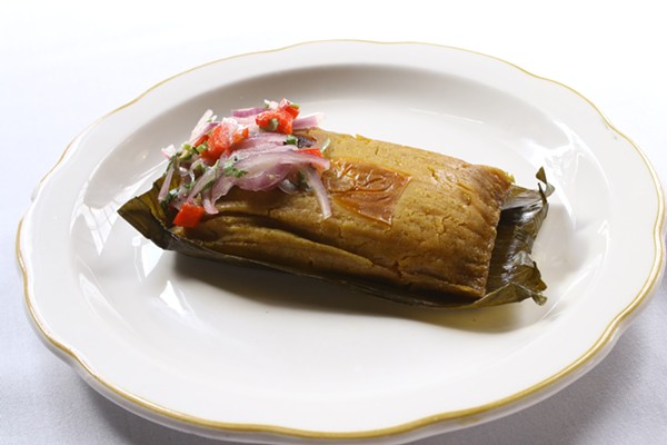 Tamal de Pollo: a Peruvian chicken tamale served with red onion salad. - CHELSEA NEULING