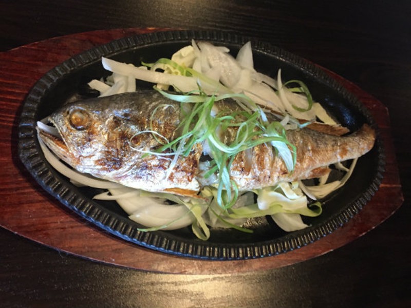 The yellow corvina grilled fish. - PHOTO BY EMILY MCCARTER