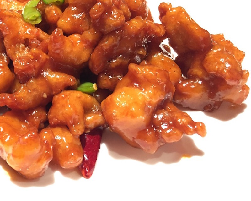 General Tso's chicken with sugar snap peas. - PHOTO BY KEVIN KORINEK