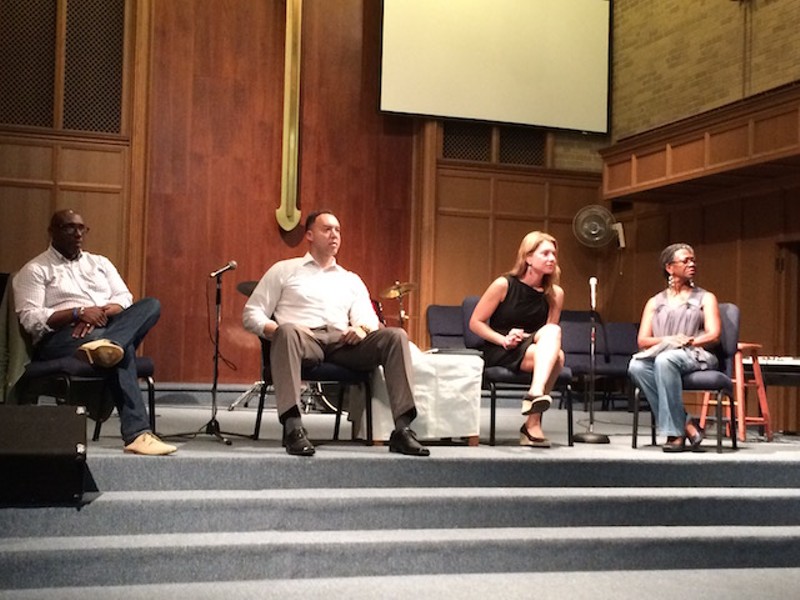 Panelists at last night's town hall meeting included Rev. Willis Johnson, NAACP member Redditt Hudson, ACLU lawyer Julie Eberstein, and Ferguson resident Judy Shaw. - PHOTO BY JESSICA KARINS