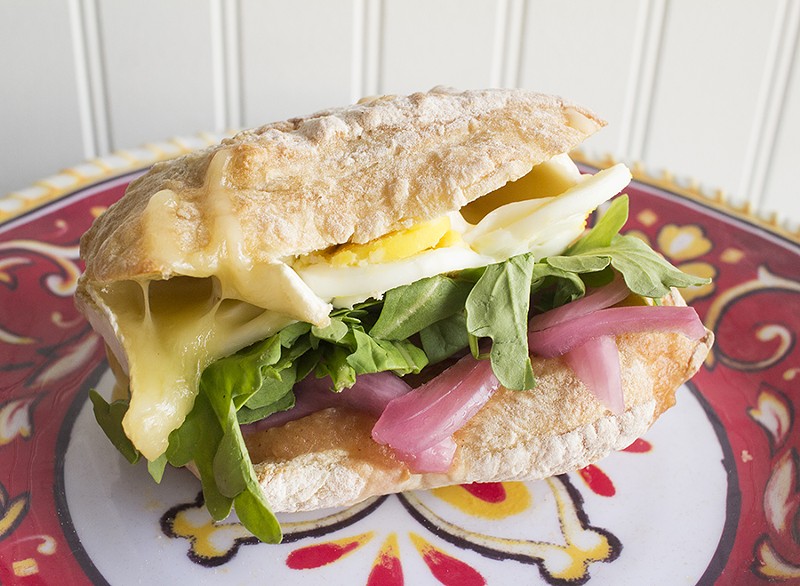 The "Mary B.E.A.R." consists of apple butter, brie, pickled red onion, a soft-boiled egg and arugula on a ciabatta bun. - PHOTO BY MABEL SUEN