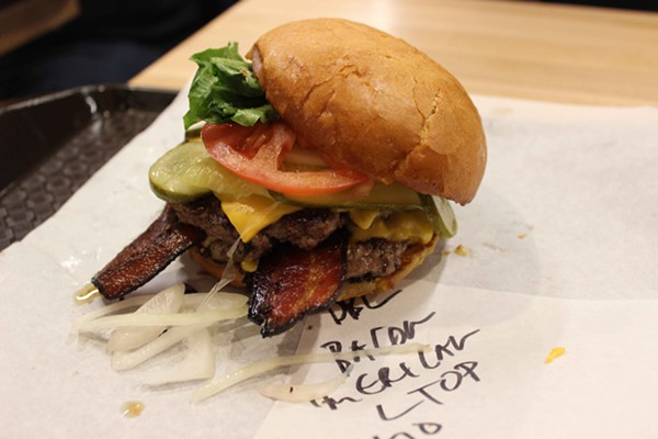 Burger topped with bacon. - Photo by Lauren Milford