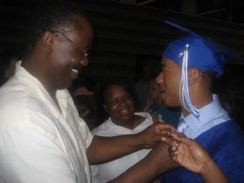 Jordan Nichols, currently serving 15 years in prison, shown here after his high school graduation with his mother and stepfather. - PHOTO COURTESY OF NICHOLS FAMILY.
