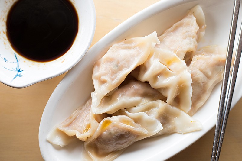 Taiwanese dumplings are served with a soy dipping sauce. - MABEL SUEN