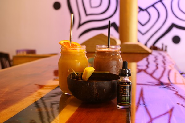 Sweet Mana and Mayan Warrior smoothies, served in Mason jars, with kava in a bowl. - Chelsea Neuling