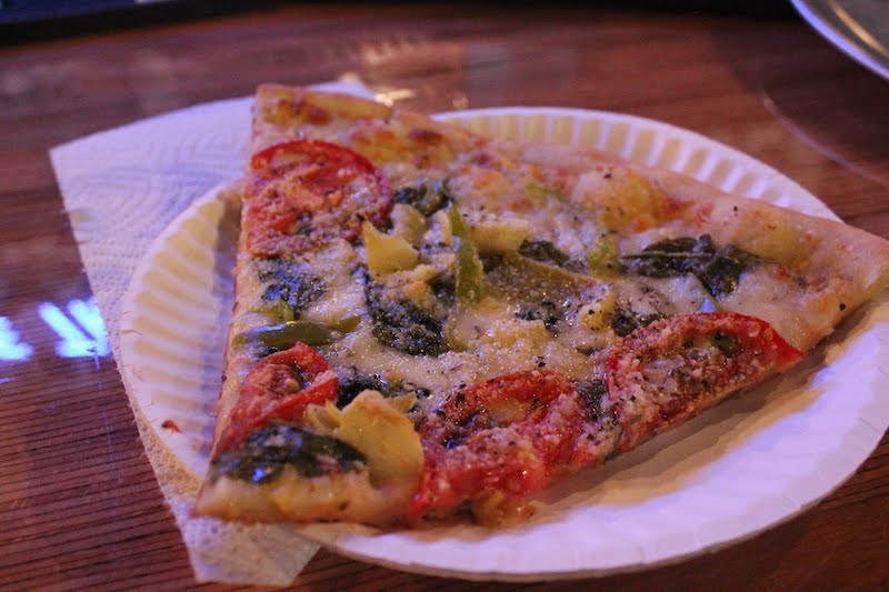 Pizza is available by the slice or as a whole pie. - KATIE COUNTS