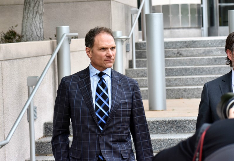 John Rallo went full power tie for his arraignment in May. - DOYLE MURPHY