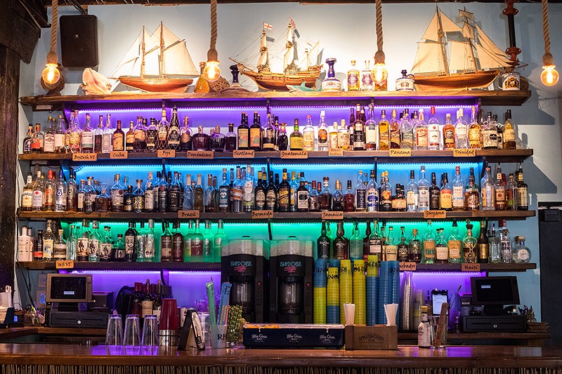 The bar is stocked with a legit rum selection for aficionados. - MABEL SUEN