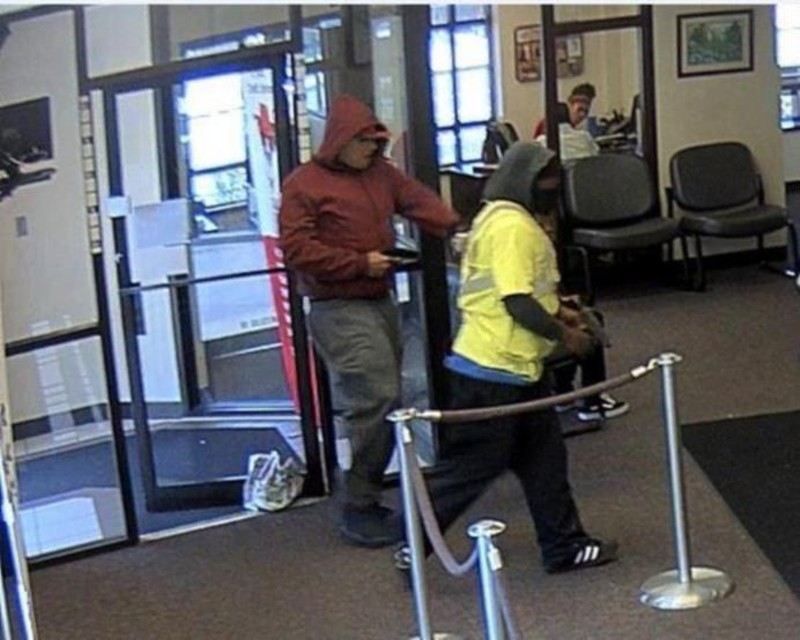 The FBI says McKee, right, and a partner robbed a St. Louis Community Credit Union in 2018. - COURTESY FBI