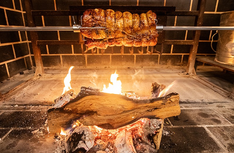 Many of BEAST Butcher & Block’s brunch items are cooked over an open flame, such as the porchetta, a standout. - MABEL SUEN