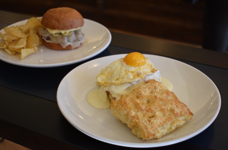 Buttermilk biscuit sandwich with a fried egg, applewood smoked ham, Cheddar and apple mustard. - LIZ MILLER