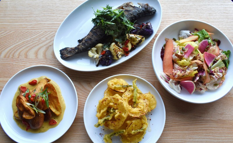 Pictured from left to right, top to bottom: whole grilled trout, chicories salad, crispy fingerling potatoes and delicata squash. - Liz Miller